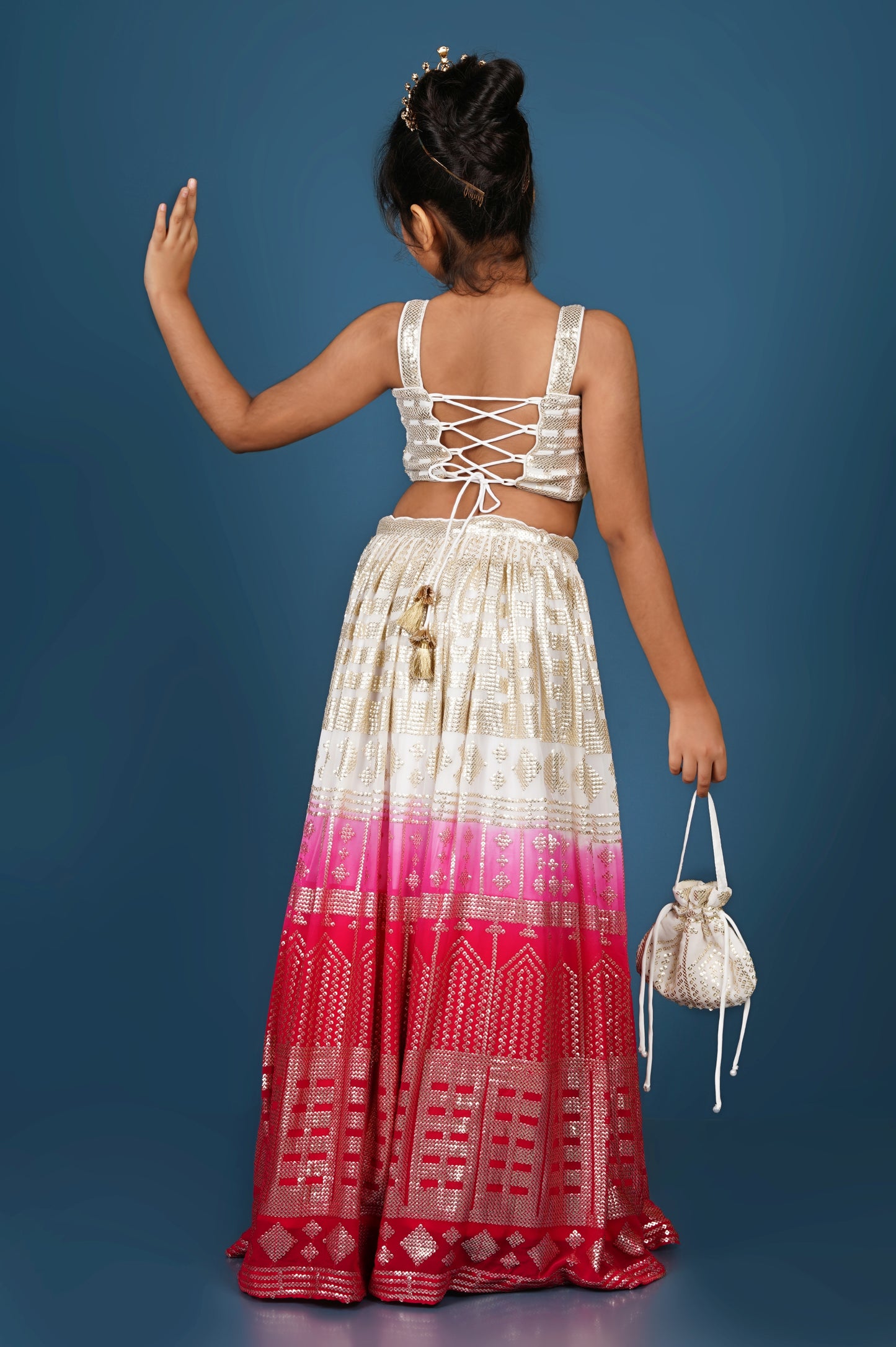 Top and Lehenga with sequins embroidery on it