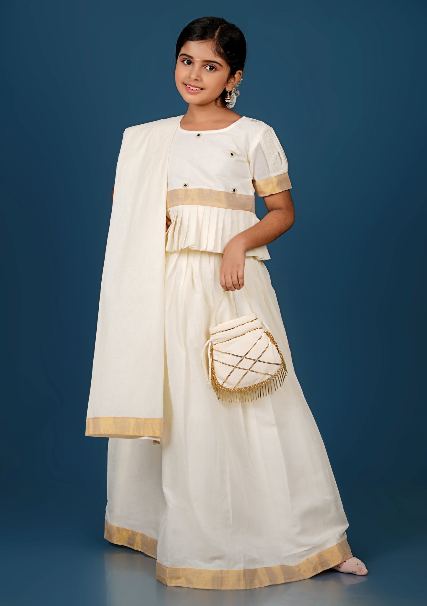 Glimmering Cream Peplum Top with Golden-Bordered Lehenga Set