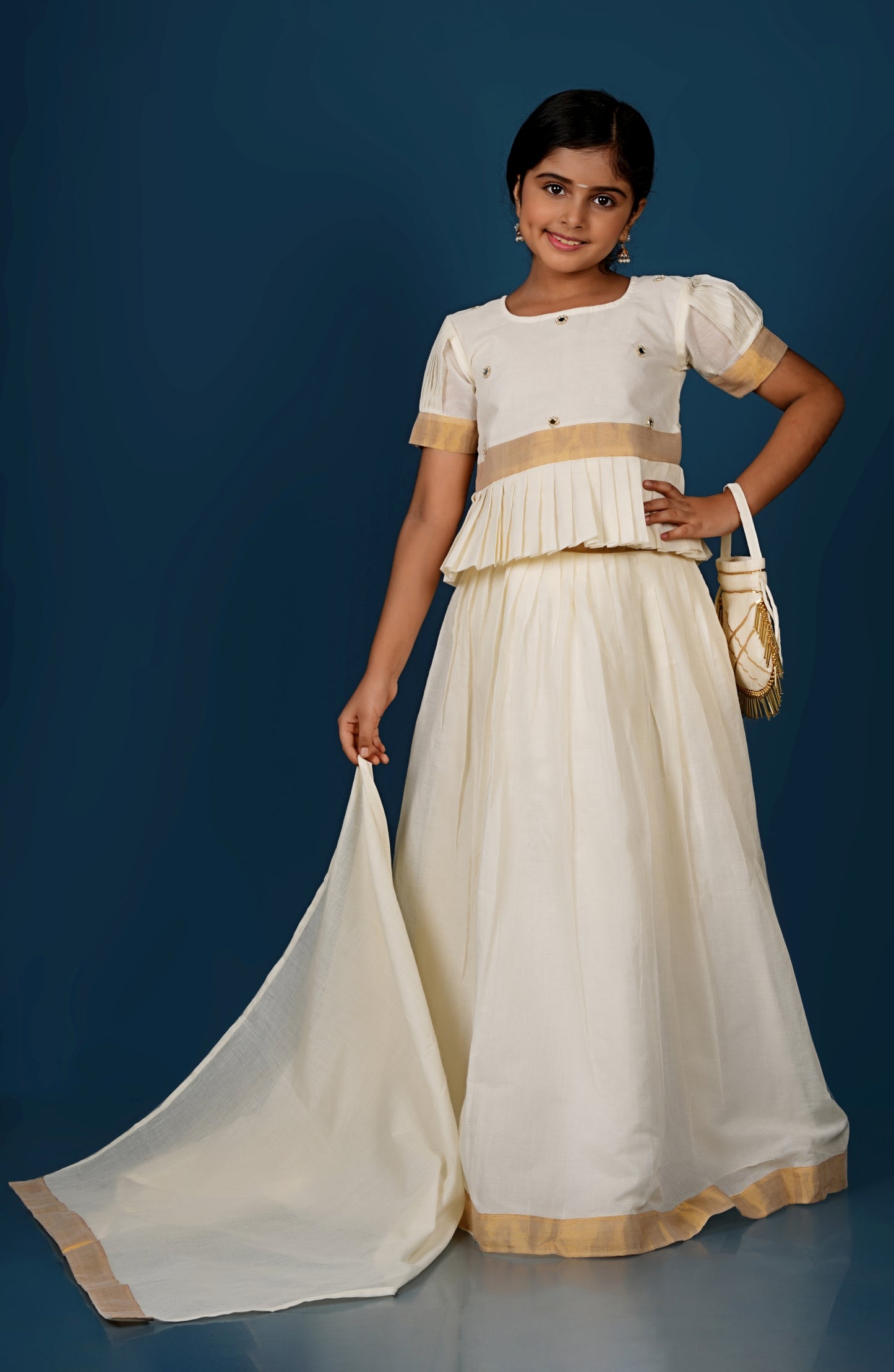 Glimmering Cream Peplum Top with Golden-Bordered Lehenga Set